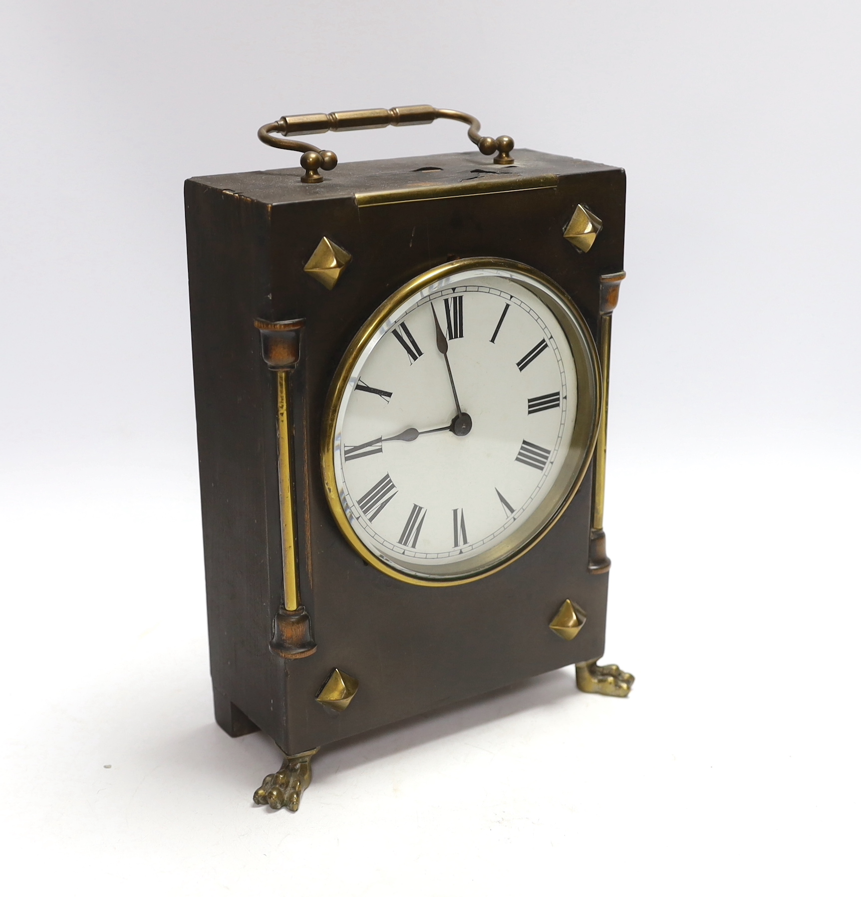 A small late 19th century ebonised mantel timepiece with studded case, 26cm